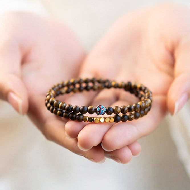 Sandalwood Triple-Wrap Bracelet with Brass and Enamel Lotus Bead
