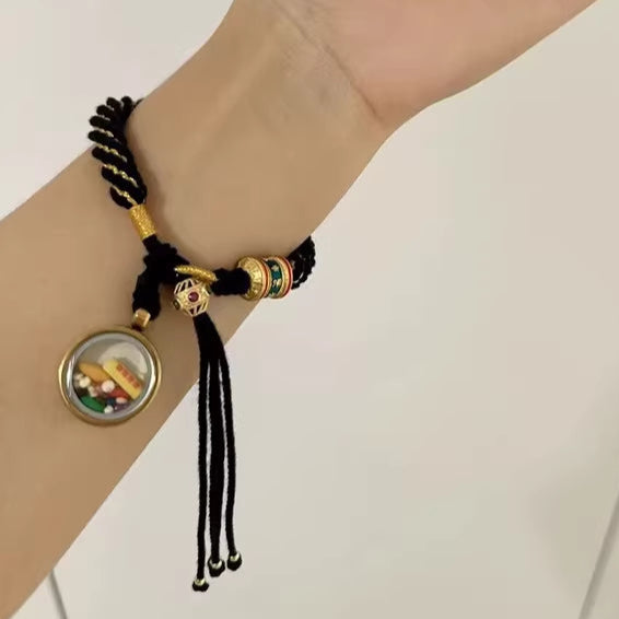 Braids of the Sacred® Tibetan Thangka Handwoven Bracelet with Six-Syllable Mantra and Protective Charms