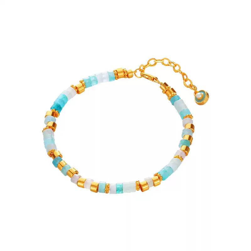 Radiant Grain® Aquamarine Seed Bead Bracelet with Gold Accents