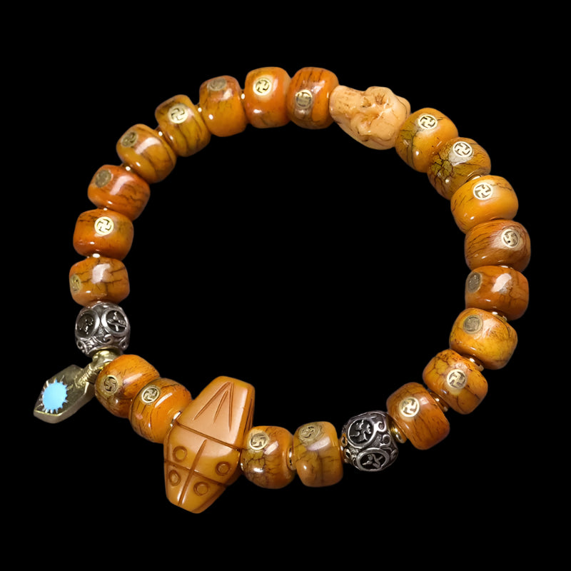 Tibetan Yak Bone Bracelet with Brass Swastika Inlay and Buddhist Accents