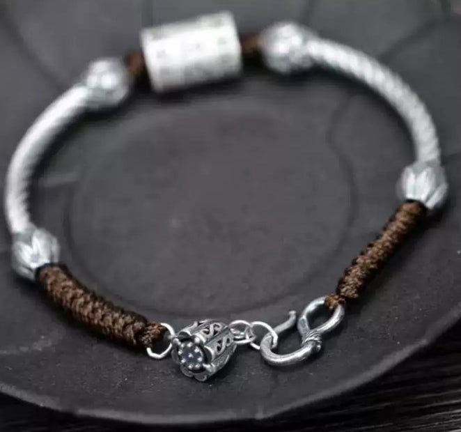Tibetan Silver Mantra Bracelet with Woven Cord & Lotus Accents