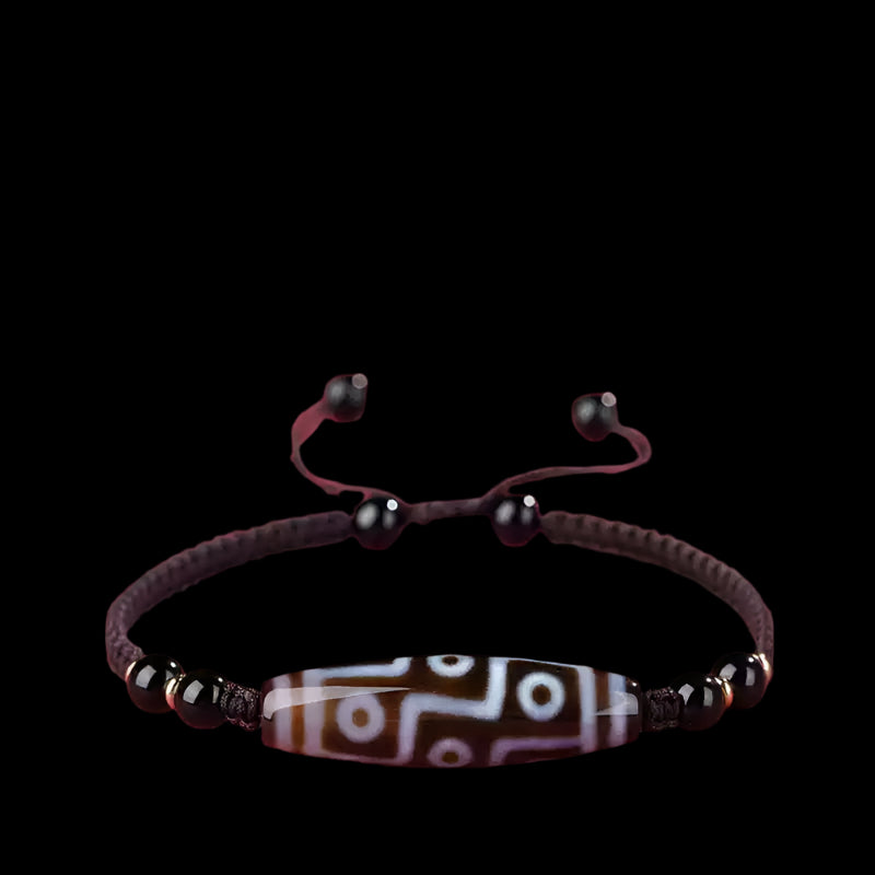 Tibetan Three-Eyed Dzi Bead Bracelet with Black Agate