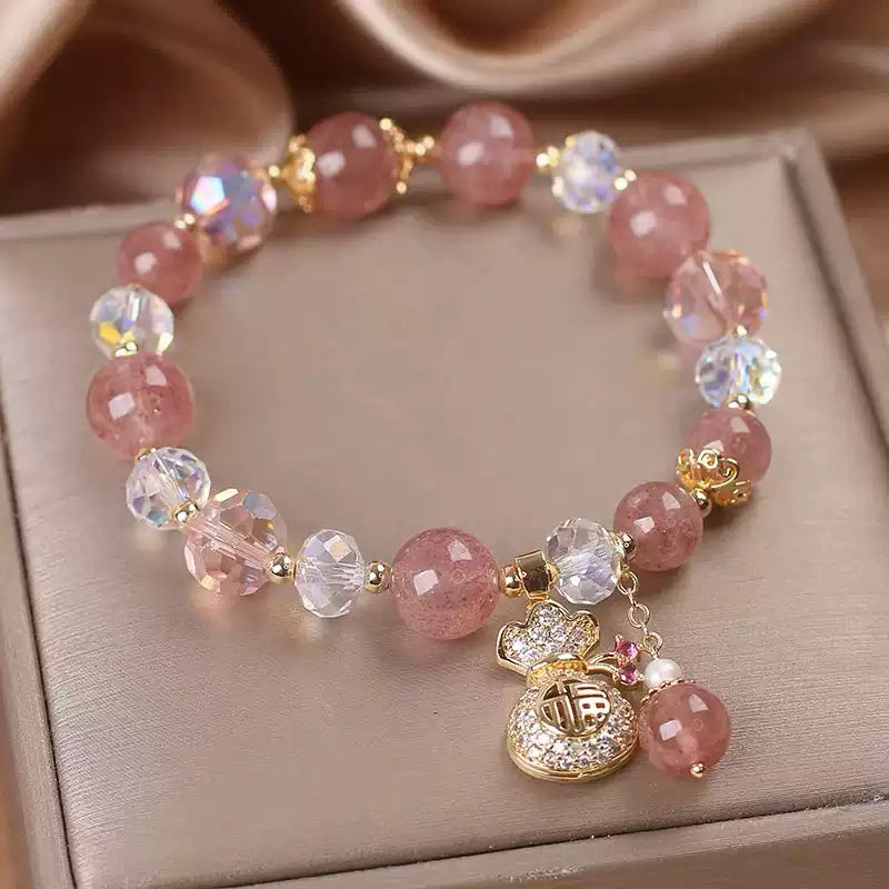Tibetan Strawberry Quartz Bracelet with Crystal Beads & Wealth Charm