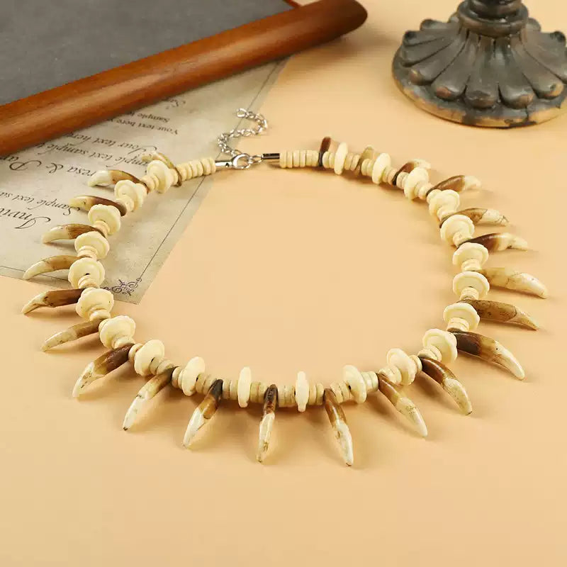 Tibetan Yak Bone Necklace with Faux Dog Tooth Charms