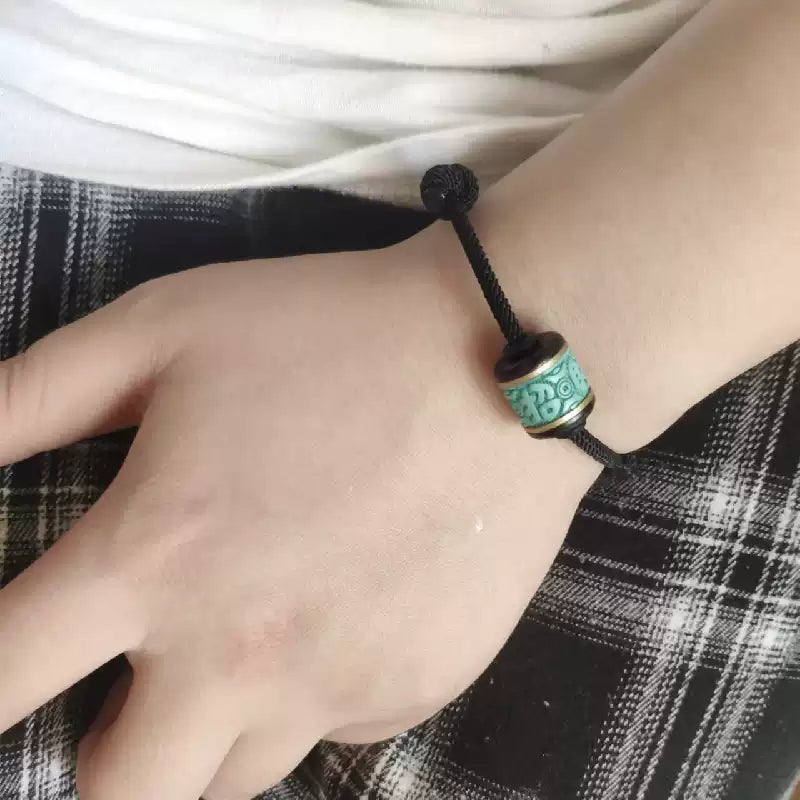 Handwoven Turquoise and Ebony Bracelet with Fortune Charm