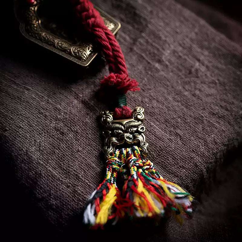 Tibetan Handcrafted Knot Pendant with Bronze Coin