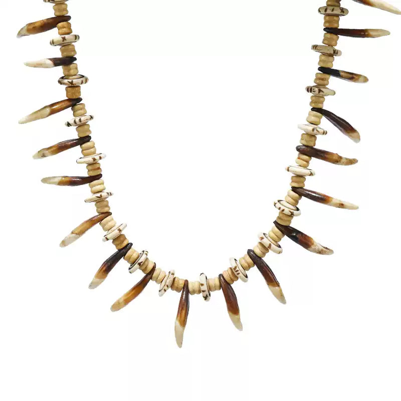 Tibetan Yak Bone Necklace with Faux Dog Tooth Charms