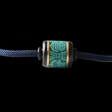 Handwoven Turquoise and Ebony Bracelet with Fortune Charm