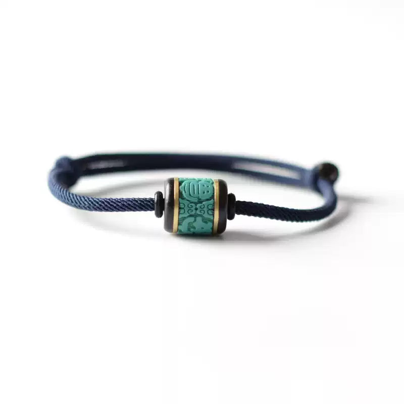 Handwoven Turquoise and Ebony Bracelet with Fortune Charm