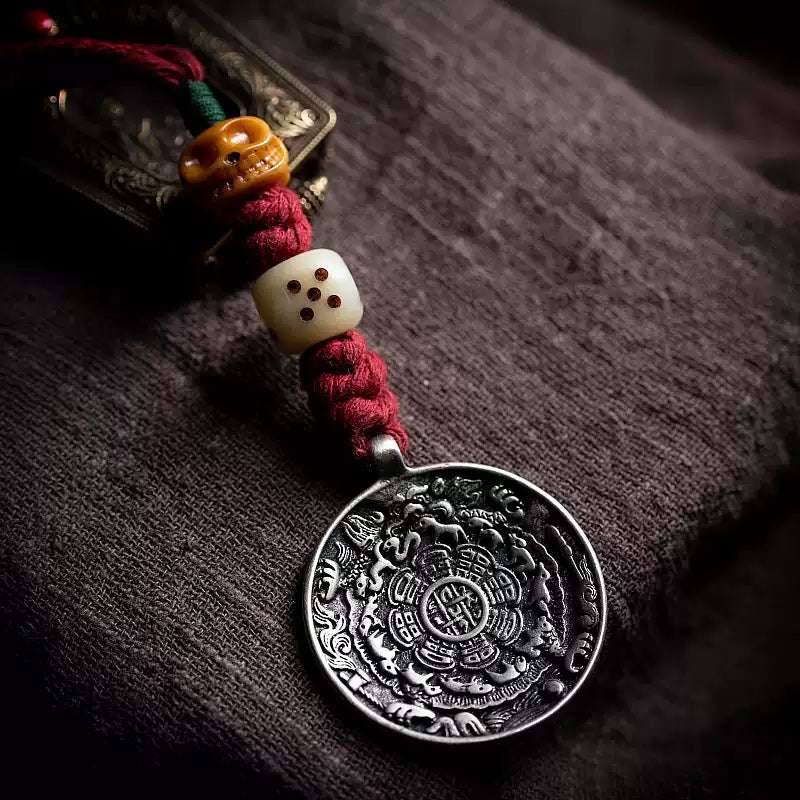 Tibetan Handcrafted Knot Pendant with Bronze Coin