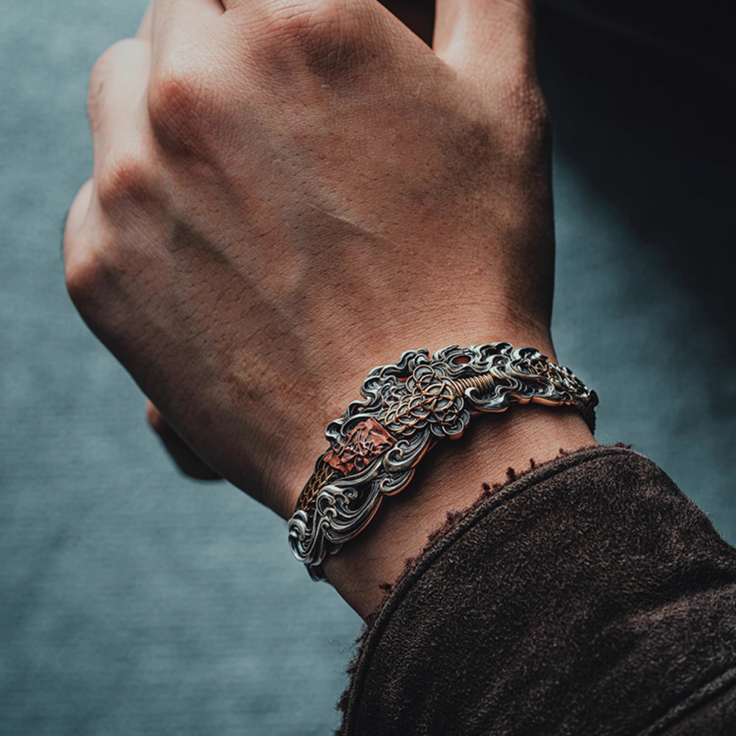Tibetan Silver & Copper Bracelet with Coin & Sword Design