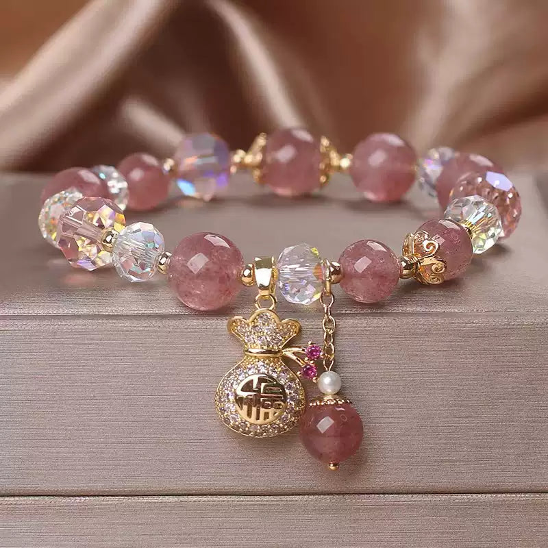 Tibetan Strawberry Quartz Bracelet with Crystal Beads & Wealth Charm