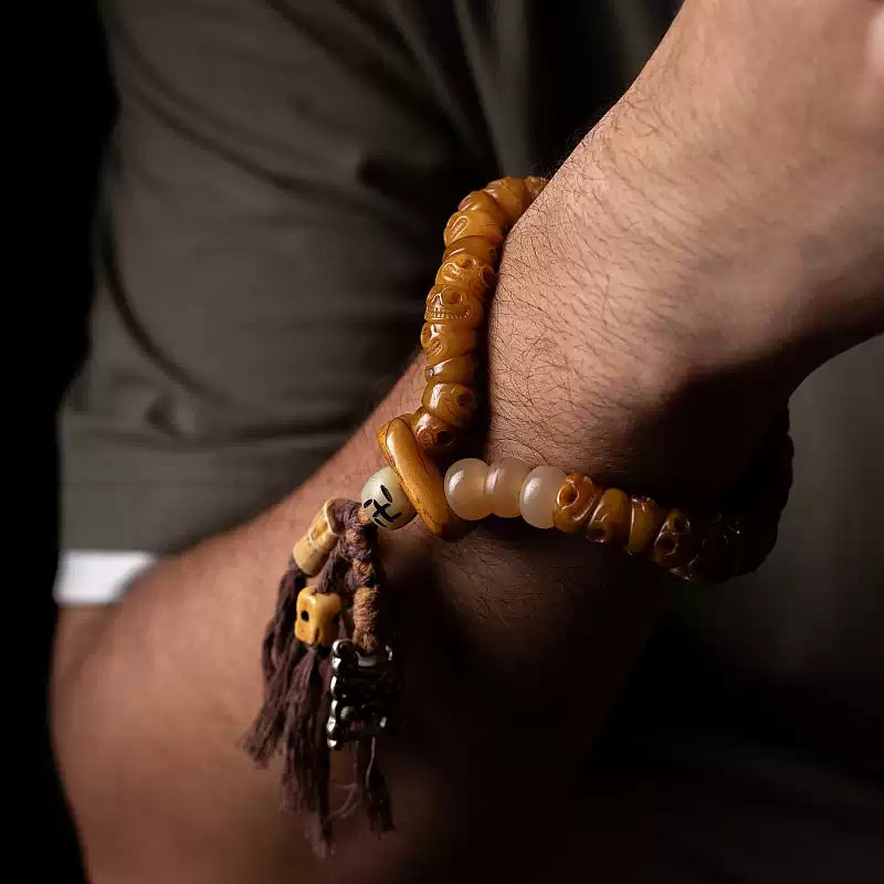 Circle of Life® Tibetan Yak Bone Skull Bead Bracelet with Tassel