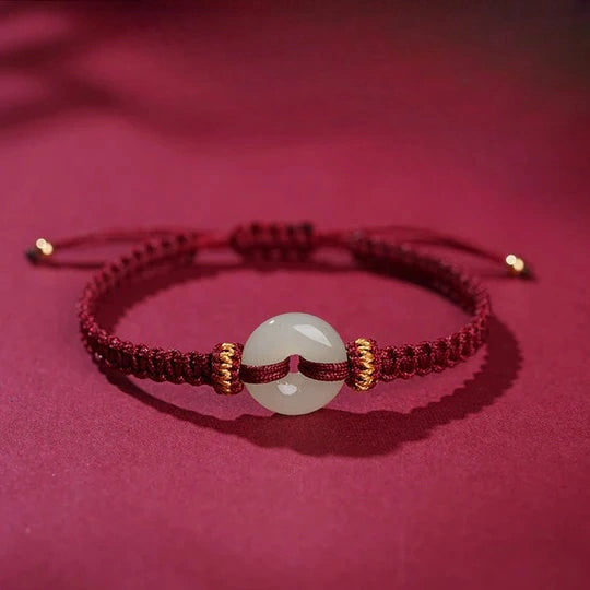 Hand-Knotted Red Cord Bracelet with Hetian Jade Peace Amulet