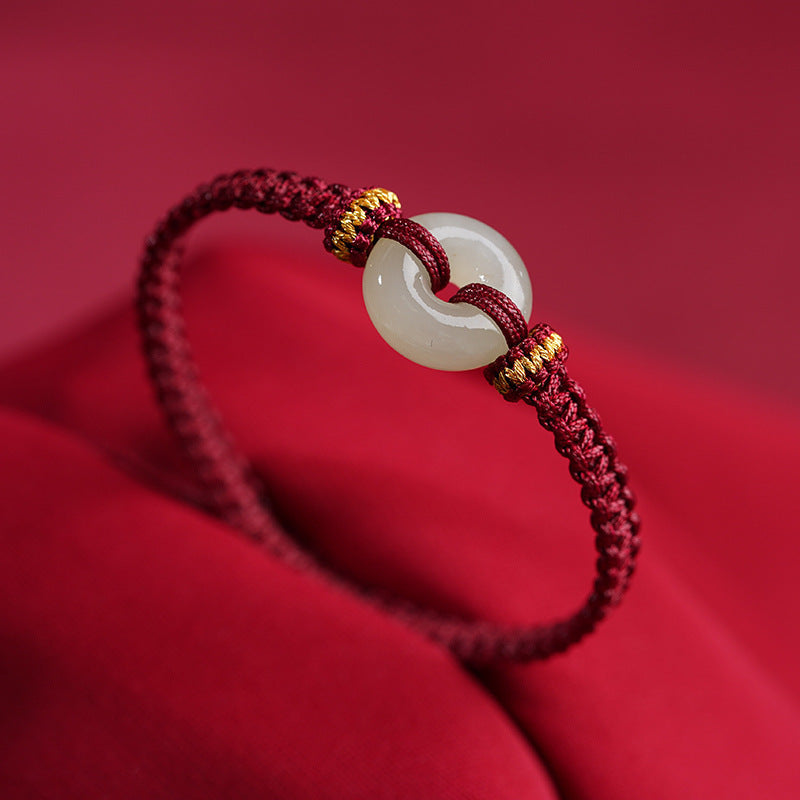Hand-Knotted Red Cord Bracelet with Hetian Jade Peace Amulet