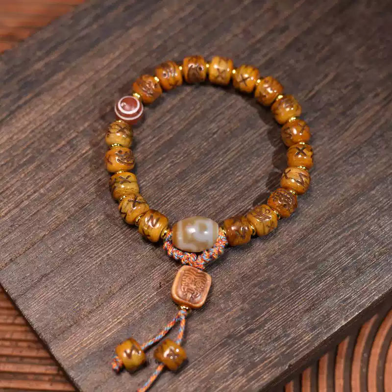Circle of Life® Yak Bone Bracelet with Carved Symbols & Agate Accent