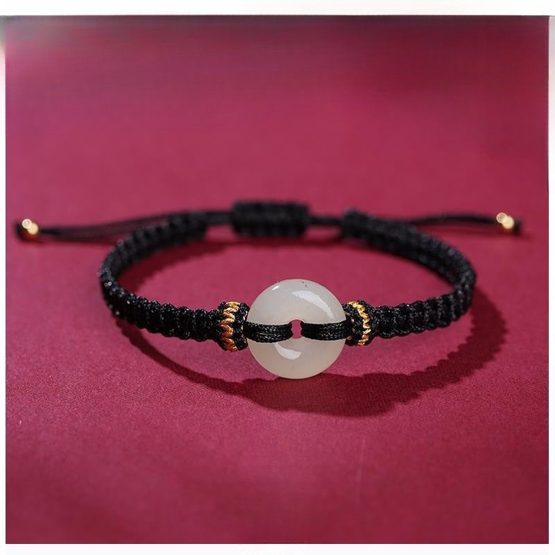 Hand-Knotted Red Cord Bracelet with Hetian Jade Peace Amulet
