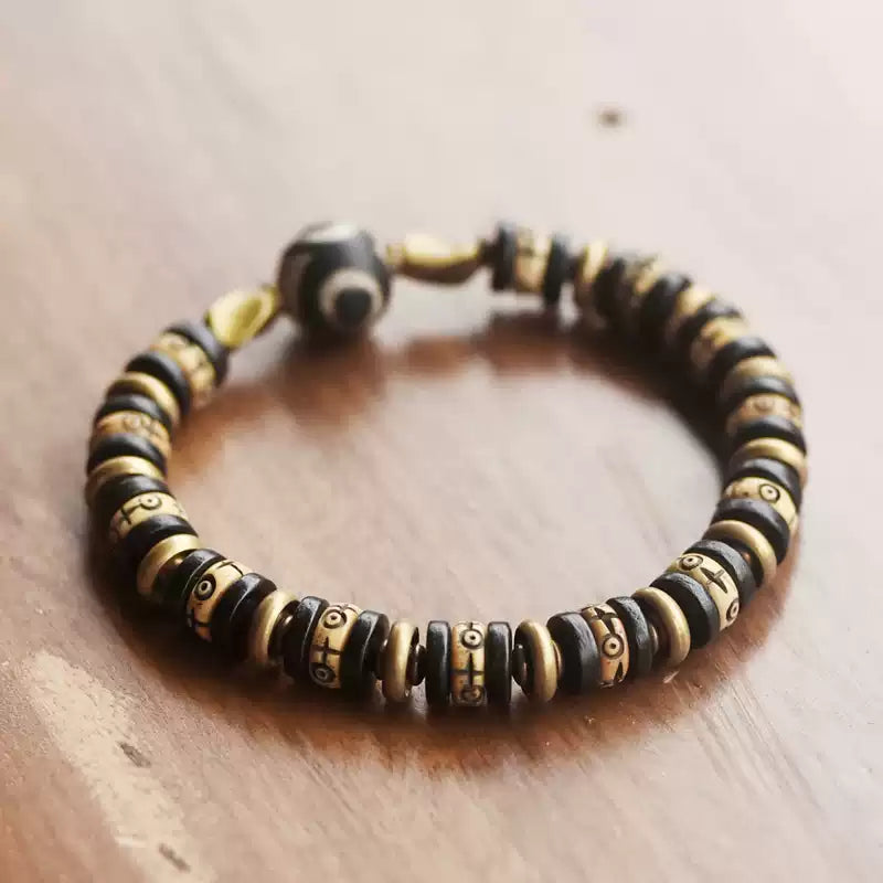 Tibetan Ox Bone Bracelet with Ebony, Brass & Dzi Bead Accents