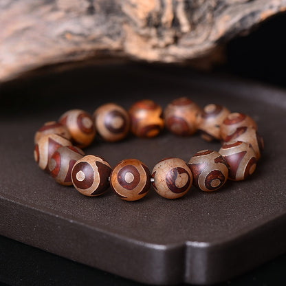 Tibetan Dzi Agate Bracelet with 3-Eye and 9-Eye Beads