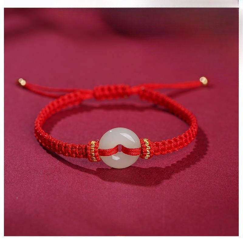 Hand-Knotted Red Cord Bracelet with Hetian Jade Peace Amulet