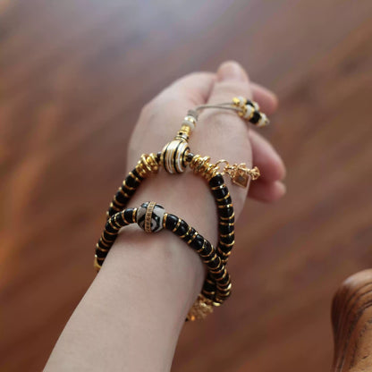 Tibetan Coconut Shell Double-Wrap Bracelet with Brass Accents