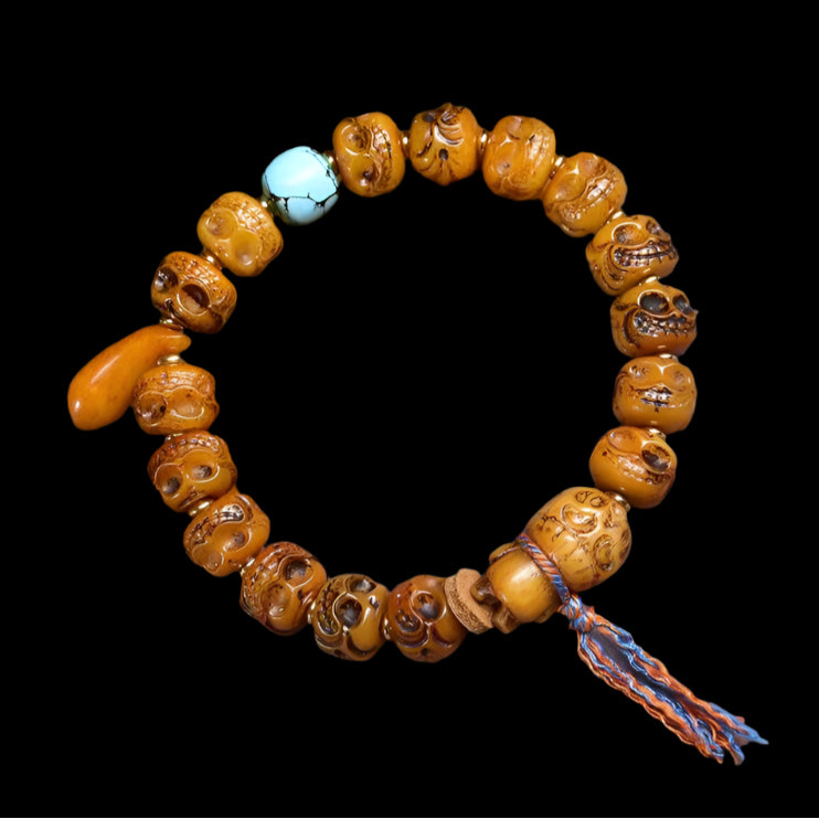 Circle of Life® Tibetan Yak Bone Bracelet with Carved Faces