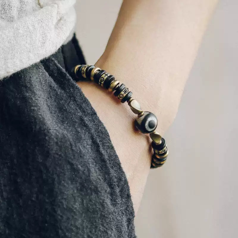 Tibetan Ox Bone Bracelet with Ebony, Brass & Dzi Bead Accents