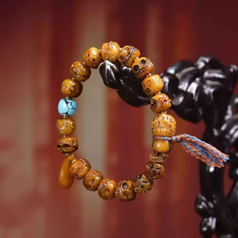 Circle of Life® Tibetan Yak Bone Bracelet with Carved Faces