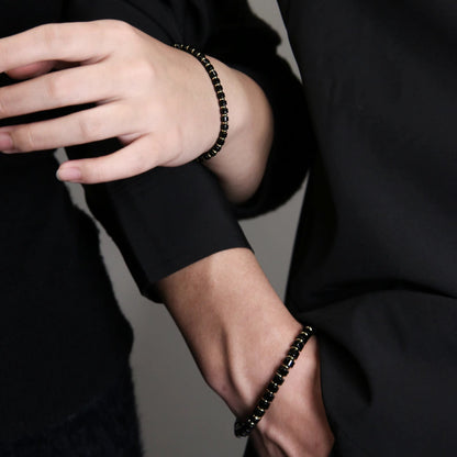 Temple Drill® Black Agate Disc Bead Bracelet
