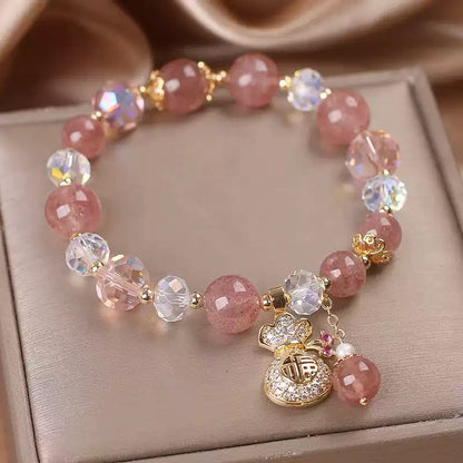 Tibetan Strawberry Quartz Bracelet with Crystal Beads & Wealth Charm