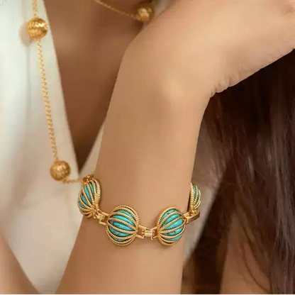 Sky Royal® Tibetan Turquoise Shell Bracelet with Gold Cage Design