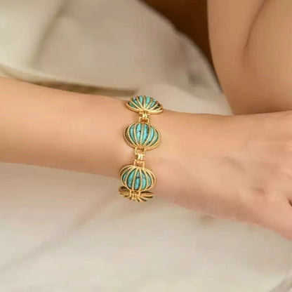 Sky Royal® Tibetan Turquoise Shell Bracelet with Gold Cage Design