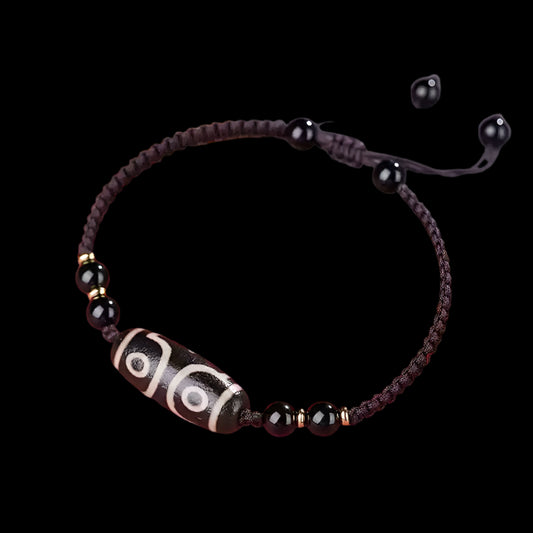 Tibetan Three-Eyed Dzi Bead Bracelet with Black Agate