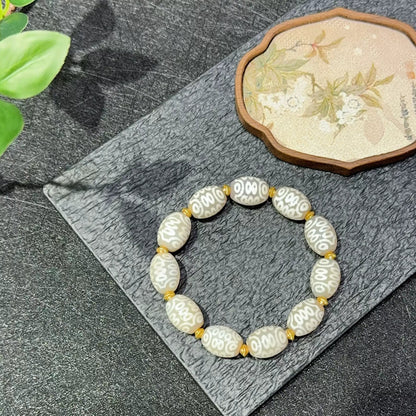 White Omen® Tibetan 21-Eye Dzi Bracelet with White Agate Beads