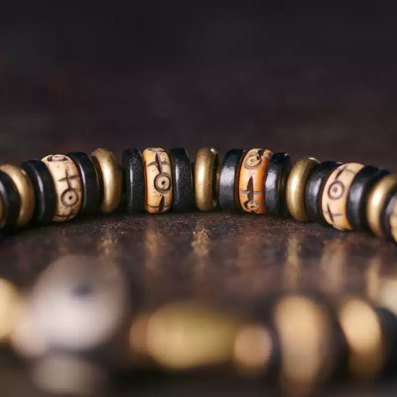 Tibetan Ox Bone Bracelet with Ebony, Brass & Dzi Bead Accents
