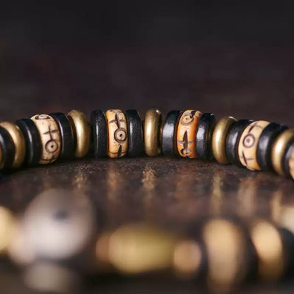 Tibetan Ox Bone Bracelet with Ebony, Brass & Dzi Bead Accents