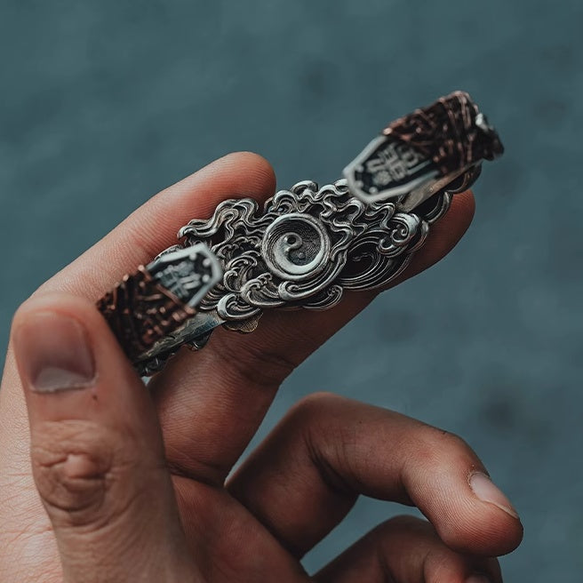 Tibetan Silver & Copper Bracelet with Coin & Sword Design