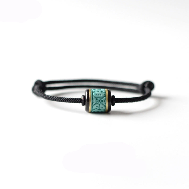 Handwoven Turquoise and Ebony Bracelet with Fortune Charm