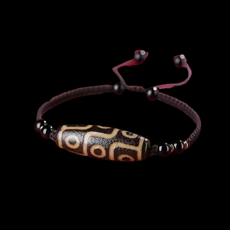 Tibetan Three-Eyed Dzi Bead Bracelet with Black Agate