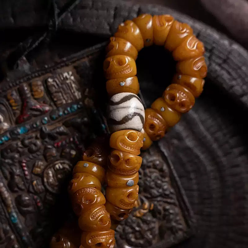 Circle of Life® Tibetan Yak Bone Skull Bead Bracelet with Tassel